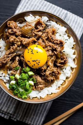 an image of gyudon or japanese beef bowl
